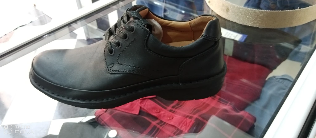 صورة لـ  ملابس الرجل واحذية الرجال