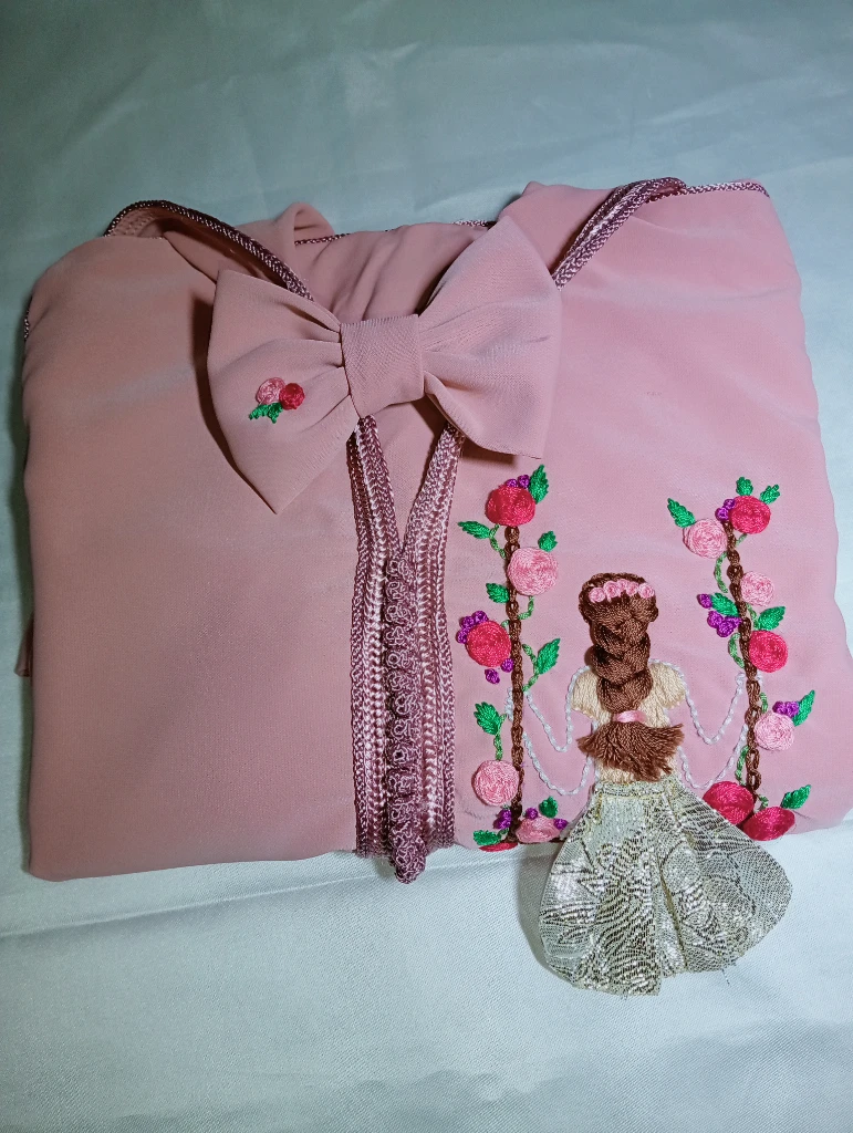 photo of الخياطة ام …